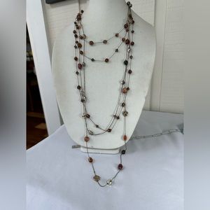 Three long station style bead necklaces